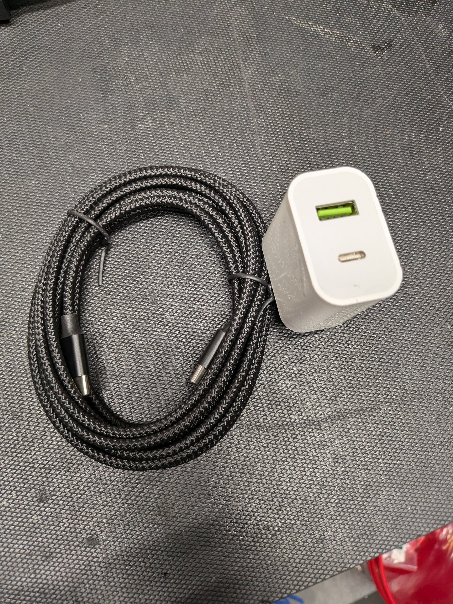 Charger and 10 foot cord for battery pack.